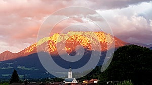 Sunset in one small village by the Alps