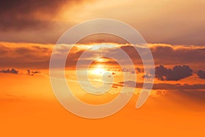 sunset and orange cloud and blue dawn sky with cloud horizontal lines motion effect on background from sunshine