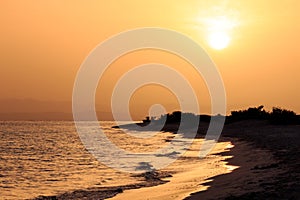 Sunset orange and red colors landscape, sea and sun with deep sky background. Red Sea, Egypt, Africa. Evening sunset view