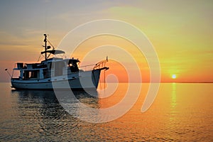 Sunset on Our Kadey Krogen 42 anchored at Annie Bight, Eleuthera Bahamas photo