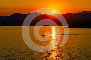 Sunset over Alpes on Azure Coast French Riviera of Mediterranean Sea seen from Saint-Jean-Cap-Ferrat town in France