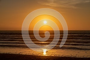 Sunset over the Atlantic Ocean from Agadir Beach, Morocco, Africa