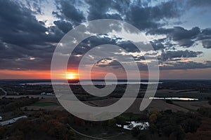 Sunset Over Autumn Fields and Lakes