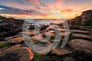 sunset over basalt columns Giant's Causeway, County Antrim, Northern Ireland