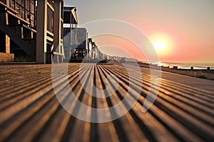 Sunset over beach huts