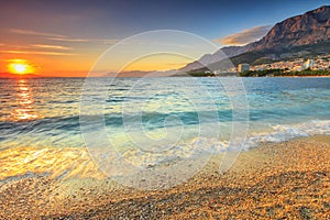 Sunset over the beach,Makarska,Dalmatia,Croatia photo