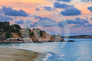 Sunset over a beach in Palma de Mallorca in Mallorca on Balearic islands in Spain