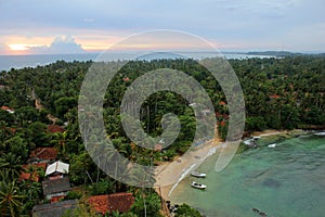 Sunset over beach and town