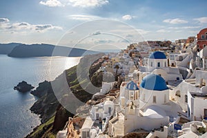 Blue and white domed churches on Santorini Greek Island, Oia town, Santorini, Greece.