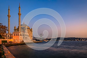 Sunset over Bosphorus and Grand Mecidiye Mosque Ortakoy Mosque, Istanbul, Turkey