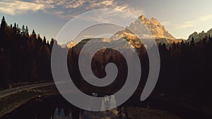 Sunset over Braies Lake and mountain. Colorful autumn landscape in Italian Alps, Dolomite, Italy, Europe. Beauty of nature.