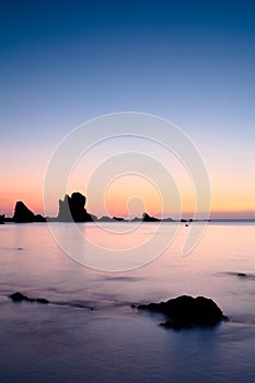 Sunset over Cantabric Sea in Silent Beach photo