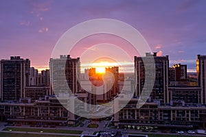 Sunset over city buildings in Saint-Petersbourg, Russia. Skyline view of cityscape with sunlight