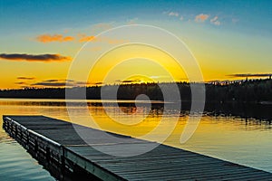 Sunset over Clear lake. Riding Mountain National Park. Manitoba Canada photo