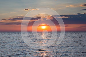 Sunset over coastline skyline