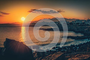 sunset over crete coastline with city skyline in the distance