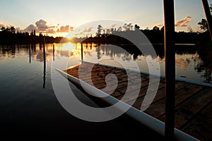 Sunset over decrepit dock