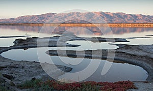 Sunset over Diablo Range from Alviso Slough. Santa Clara County, California, USA.