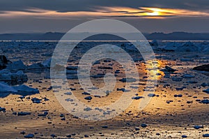 Sunset over Disko bay, Greenland photo