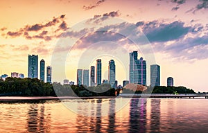 Sunset over emirate of Sharjah skyline