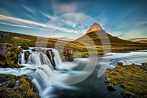 Sunset over the famous Kirkjufellsfoss Waterfall in Iceland