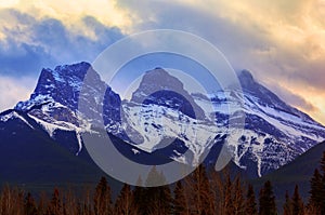 Sunset Over Famous Three Sisters Mountain Peaks in Canmore, Canada