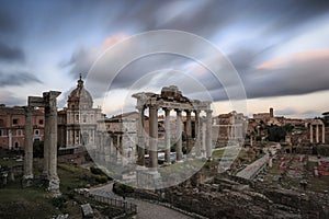 Sunset over Forum Romanum Fori Romani ancient site of antique city of Rome near Palatino hill photo