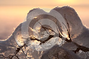 Sunset over frozen lake