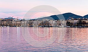 Sunset over Geneva. Embankment of leman River