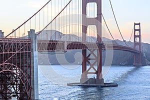 Sunset over the Golden Gate Bridge as seen from the span`s southern end.