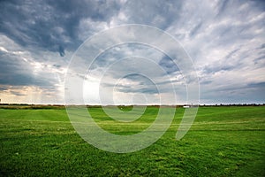 Sunset over the golf course, luxury green field at the golf club