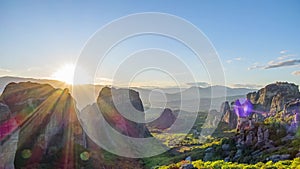 Sunset over the Greek rock monastery. Time lapse