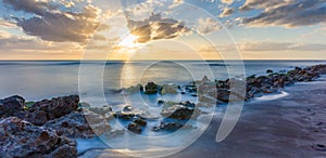 Sunset over Gulf of Mexico from Caspersen Beach in Venice Florida photo