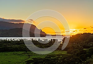 Sunset over Hanalei bay from overlook on the road