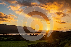 Sunset over Hanalei bay from overlook on the road