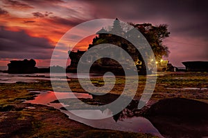 Sunset over hindu temple Pura Tanah Lot, Bali