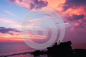 Sunset over hindu temple Tanah Lot, Bali