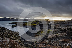 Sunset over Iceland Landscape with green moss during golden hour