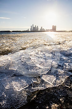 Sunset over an icy Humber Bay, seen from the Sunnyside boardwalk at Budapest Park