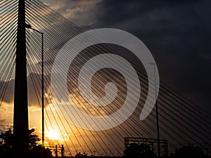 Sunset over industrial part of town