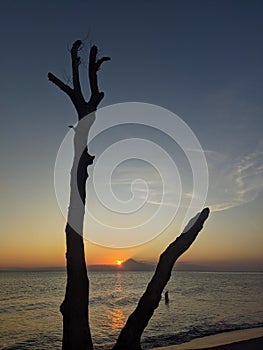 sunset over the island of bali photo