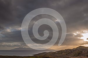 Sunset over Isle of Lewis, seen from Isle of Skye photo