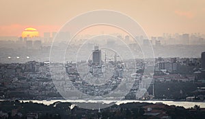 Sunset over Istanbul Silhouette. City landscape with modern buildings and bosphorus