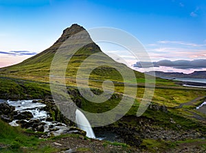 Sunset over the Kirkjufellsfoss Waterfall with Kirkjufell Mountain