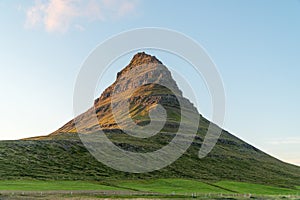 Sunset over the Kirkjufellsfoss Waterfall with Kirkjufell Mountain