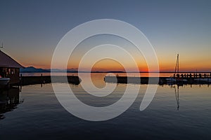 Sunset over Lake Chiemsee in the bavarian Chiemgau alps