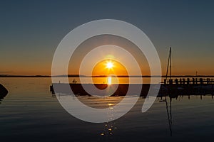 Sunset over Lake Chiemsee in the bavarian Chiemgau alps