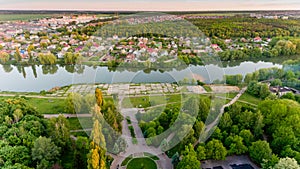 Sunset over the lake in the city.