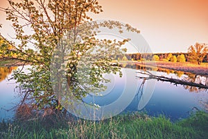 Sunset over the lake in early spring