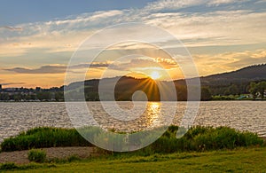 Sunset over Lake Lipno with stand up paddel